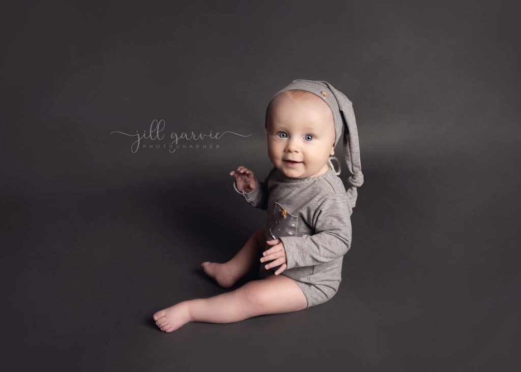 Photograph of baby at 6 - 9 months old taken at Jill Garvie Photography studio Musselburgh
