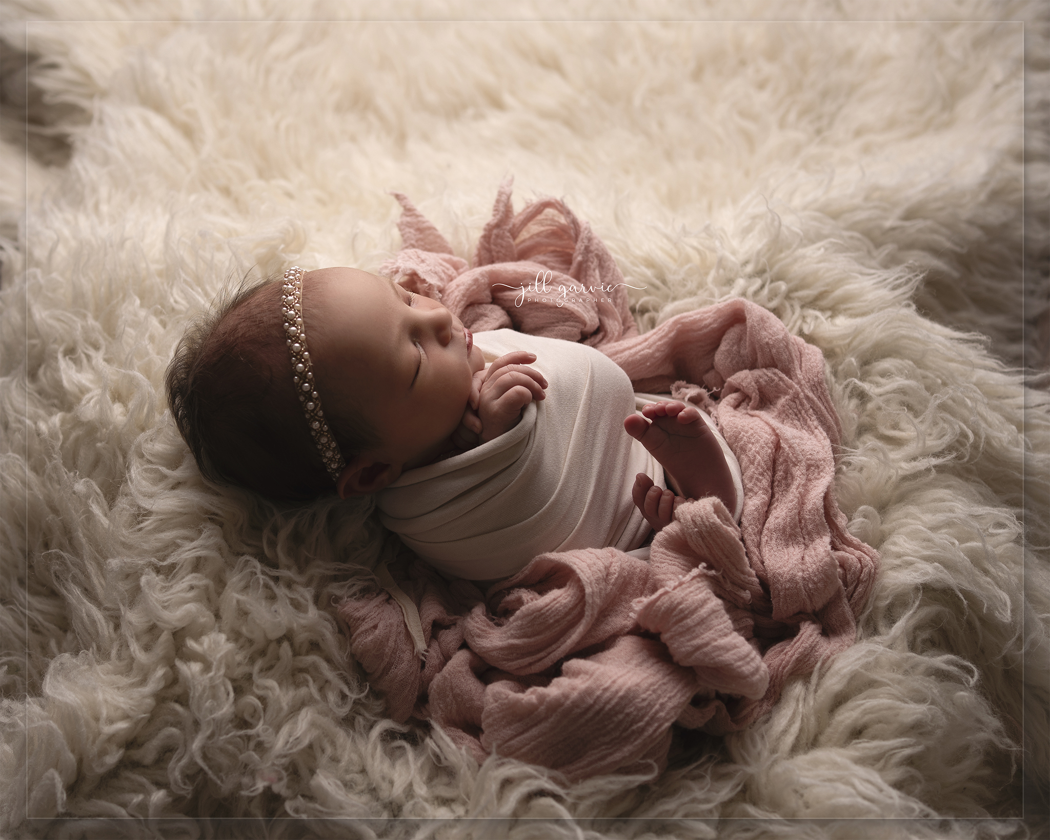 Newborn baby Sloane at her photoshoot