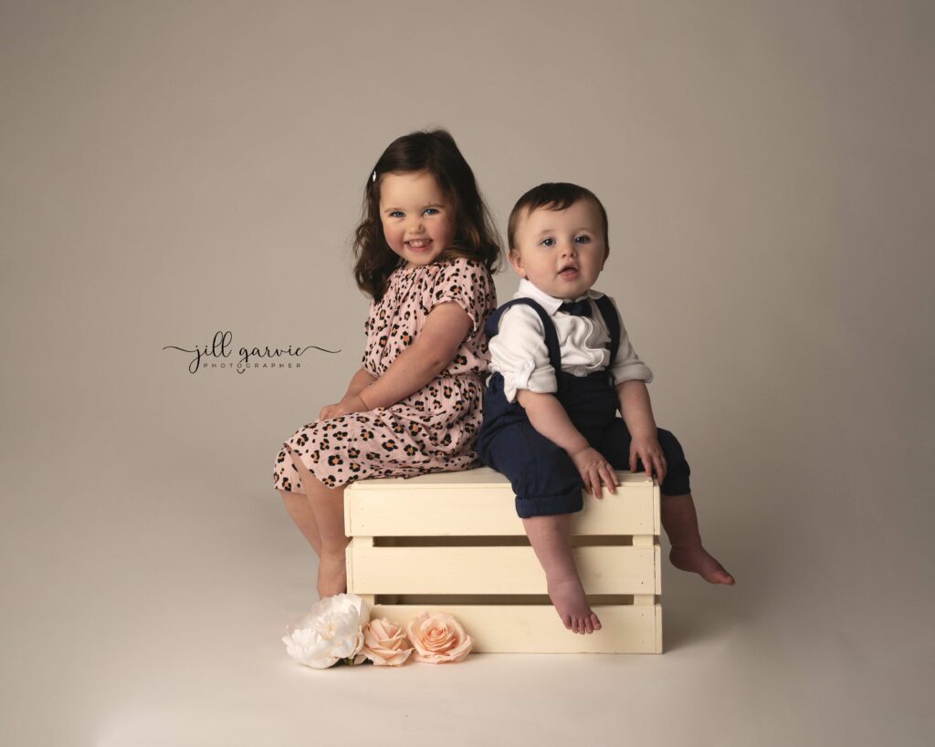 Big sister and little brother at family photoshoot in Jill Garvie Photography studio, Edinburgh